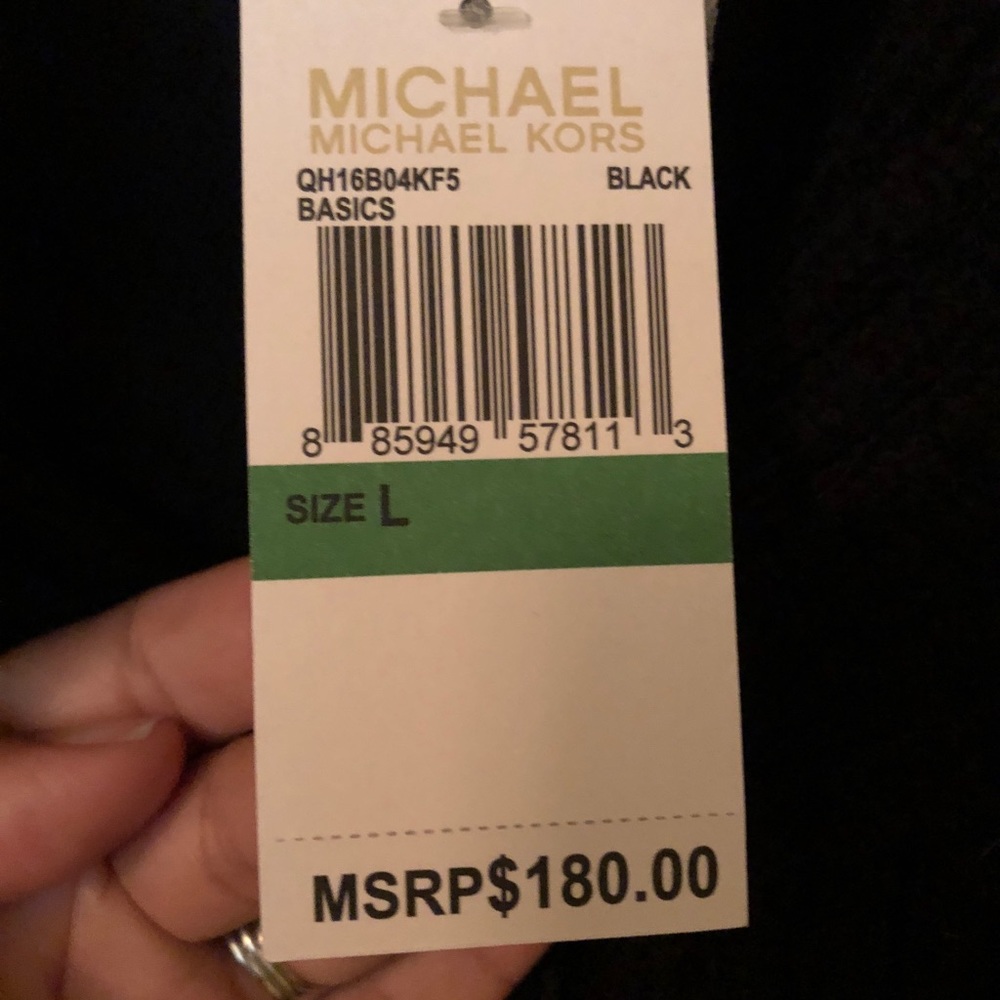 Michael Kors Ostrich feather inspired black vest.